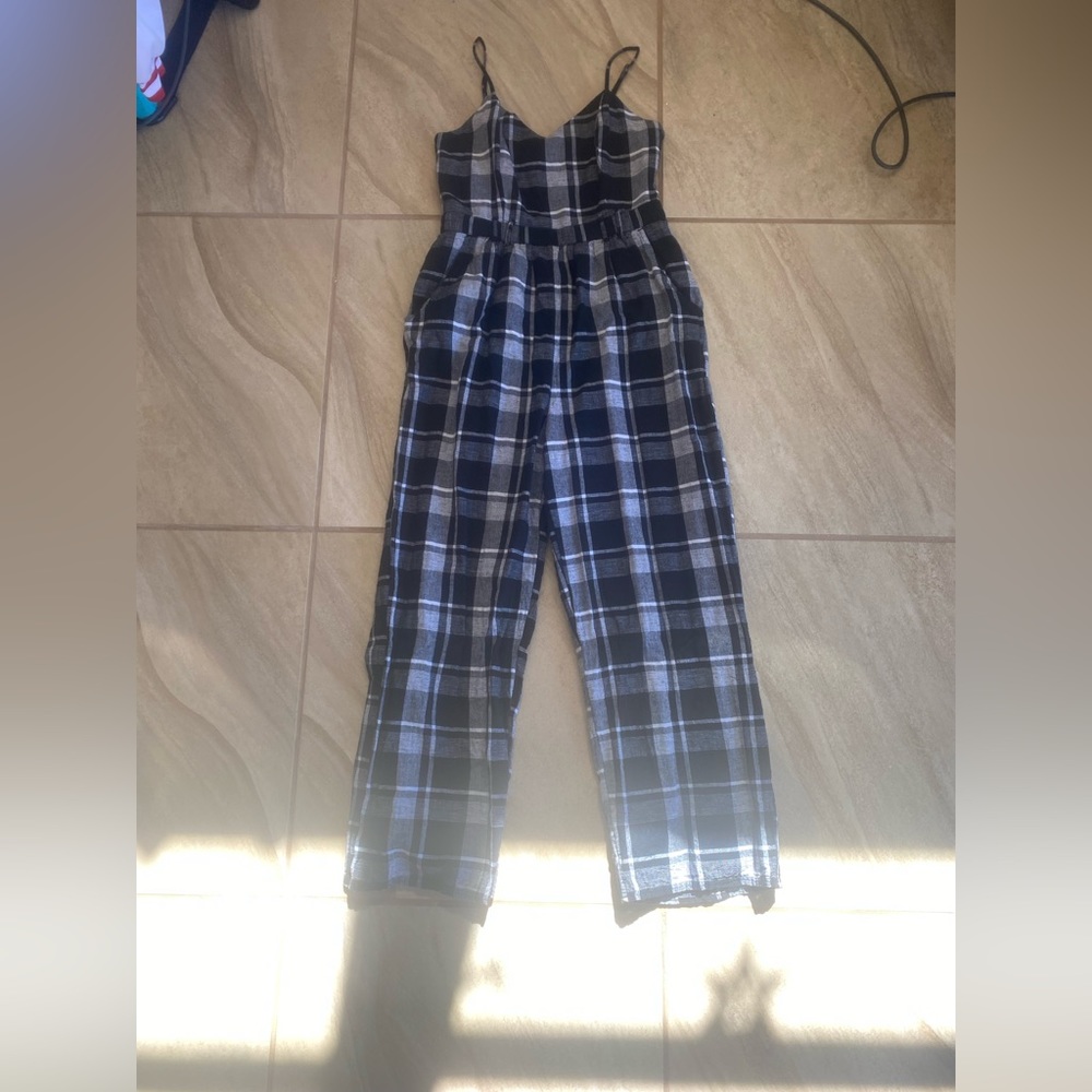 Checkered jumpsuit.